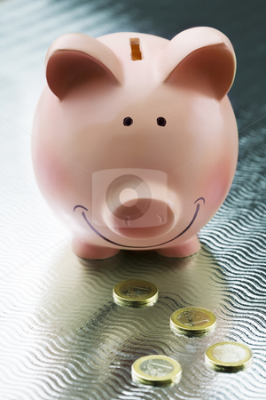To use this stock image in your creative project, please select the size you need over to the right and click the "Add to Cart" button.
Your downloaded image will come with the Cutcaster watermark removed so don’t worry about the watermark you see on this page. Piggy bank stock photo, Happy piggy bank and golden euro coins by Liv Friis-Larsen