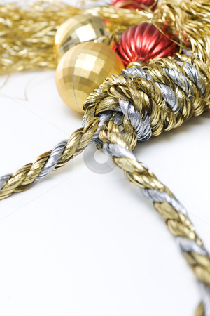 To use this stock image in your creative project, please select the size you need over to the right and click the "Add to Cart" button.
Your downloaded image will come with the Cutcaster watermark removed so don’t worry about the watermark you see on this page. Christmas Pressures stock photo, Noose made out of christmas rope, with baubles in the background, isolated on white. by Kevin Woodrow
