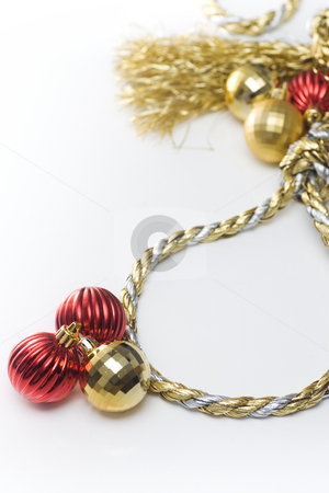 To use this stock image in your creative project, please select the size you need over to the right and click the "Add to Cart" button.
Your downloaded image will come with the Cutcaster watermark removed so don’t worry about the watermark you see on this page. Christmas Pressures stock photo, Noose made out of christmas rope, with baubles in the background, isolated on white. by Kevin Woodrow