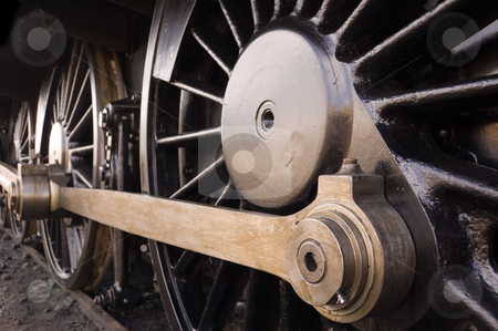 To use this stock image in your creative project, please select the size you need over to the right and click the "Add to Cart" button.
Your downloaded image will come with the Cutcaster watermark removed so don’t worry about the watermark you see on this page. Steam locomotive wheel stock photo, Steam locomotive wheel and coupling rods by Peter Cox