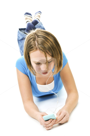 To use this stock image in your creative project, please select the size you need over to the right and click the "Add to Cart" button.
Your downloaded image will come with the Cutcaster watermark removed so don’t worry about the watermark you see on this page. Teenage girl listening to music stock photo, Teenage girl listening to music with her mp3 player by Elena Elisseeva