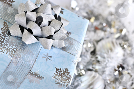 Christmas gift box Christmas gift box stock photo, Wrapped gift box with silver Christmas ornaments by Elena Elisseeva