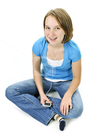 To use this stock image in your creative project, please select the size you need over to the right and click the "Add to Cart" button.
Your downloaded image will come with the Cutcaster watermark removed so don’t worry about the watermark you see on this page. Teenage girl listening to music stock photo, Teenage girl listening to music with her mp3 player by Elena Elisseeva