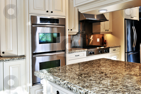 Kitchen interior Kitchen interior stock photo, Interior of modern luxury kitchen with stainless steel appliances by Elena Elisseeva