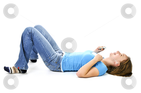 To use this stock image in your creative project, please select the size you need over to the right and click the "Add to Cart" button.
Your downloaded image will come with the Cutcaster watermark removed so don’t worry about the watermark you see on this page. Teenage girl listening to music stock photo, Teenage girl listening to music with her mp3 player by Elena Elisseeva