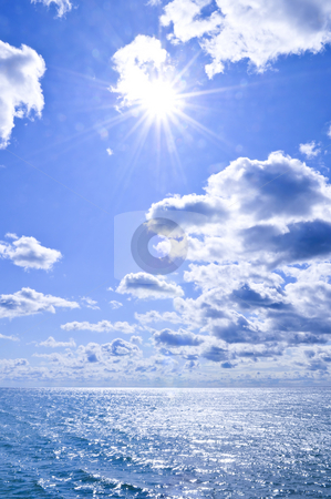 To use this stock image in your creative project, please select the size you need over to the right and click the "Add to Cart" button.
Your downloaded image will come with the Cutcaster watermark removed so don’t worry about the watermark you see on this page. Blue water and sunny sky background stock photo, Blue ocean water and sunny sky background by Elena Elisseeva