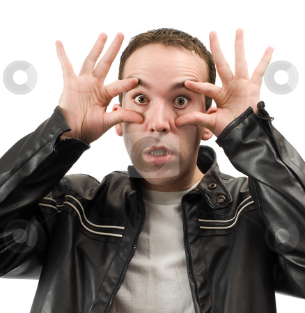To use this stock image in your creative project, please select the size you need over to the right and click the "Add to Cart" button.
Your downloaded image will come with the Cutcaster watermark removed so don’t worry about the watermark you see on this page. Wide Eyed stock photo, A young man wearing a leather jacket is holding his eyes open, isolated against a white background by Richard Nelson