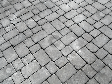 Close up of cobblestones on an old English road. Close up of cobblestones on an old English road. stock photo, Close up of cobblestones on an old English road. by Stephen Rees