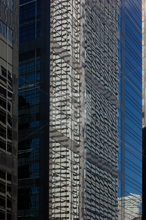 To use this stock image in your creative project, please select the size you need over to the right and click the "Add to Cart" button.
Your downloaded image will come with the Cutcaster watermark removed so don’t worry about the watermark you see on this page. Building stock photo, Reflection in a glass wall of a high-rise building by Pavel Cheiko