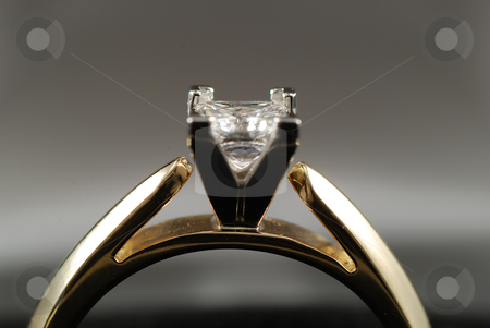 To use this stock image in your creative project, please select the size you need over to the right and click the "Add to Cart" button.
Your downloaded image will come with the Cutcaster watermark removed so don’t worry about the watermark you see on this page. Diamond ring stock photo, Stock picture of a engagement ring with a diamond by Albert Lozano