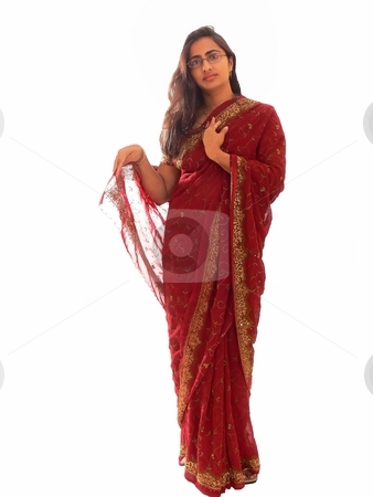 To use this stock image in your creative project, please select the size you need over to the right and click the "Add to Cart" button.
Your downloaded image will come with the Cutcaster watermark removed so don’t worry about the watermark you see on this page. Indian lady in her native dress. stock photo, An Indian lady is standing in her elegant native red dress with her long
brunette hair on white background. by Horst Petzold