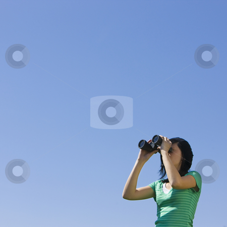 To use this stock image in your creative project, please select the size you need over to the right and click the "Add to Cart" button.
Your downloaded image will come with the Cutcaster watermark removed so don’t worry about the watermark you see on this page. Teen with binoculars stock photo, A teenager looks through binoculars by Rick Becker-Leckrone