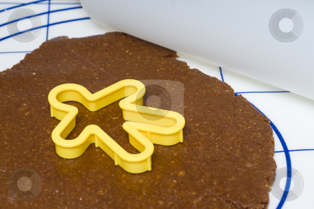 To use this stock image in your creative project, please select the size you need over to the right and click the "Add to Cart" button.
Your downloaded image will come with the Cutcaster watermark removed so don’t worry about the watermark you see on this page. Gingerbread Cookies stock photo, Some gingerbread cookie batter about to be cutout by Richard Nelson