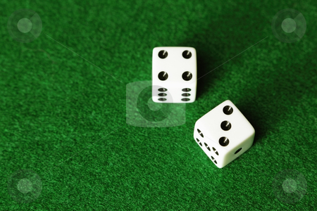 To use this stock image in your creative project, please select the size you need over to the right and click the "Add to Cart" button.
Your downloaded image will come with the Cutcaster watermark removed so don’t worry about the watermark you see on this page. Dice on green background stock photo, Dice on green background by Bryan Mullennix