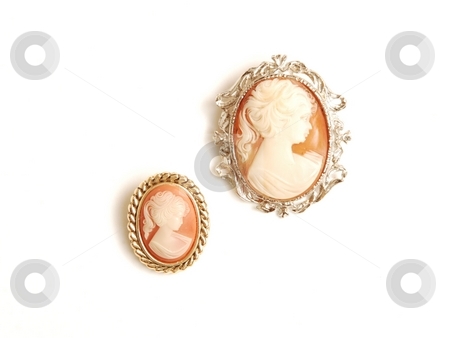 To use this stock image in your creative project, please select the size you need over to the right and click the "Add to Cart" button.
Your downloaded image will come with the Cutcaster watermark removed so don’t worry about the watermark you see on this page. Antique cameo brooch. stock photo, Two cameo brooch with silver around, beige and orange on white background. by Horst Petzold