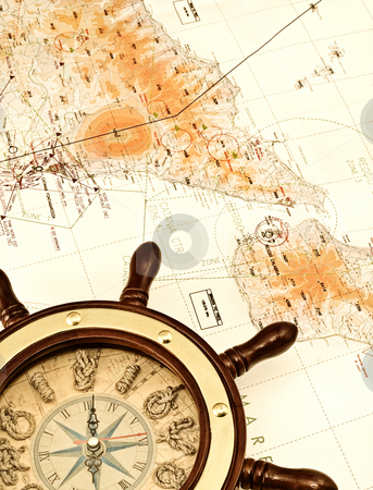 Helm on the map Helm on the map stock photo, Conceptual image of travel,exploration or adventure, in light sepia style by Vladimir Koletic