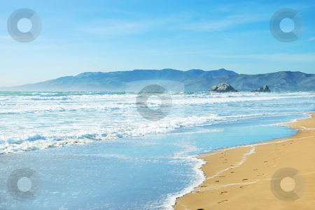 Beach in San Francisco California Beach in San Francisco California stock photo, Beach in San Francisco California with waves coming to the sand and blue sky background. by Denis Radovanovic