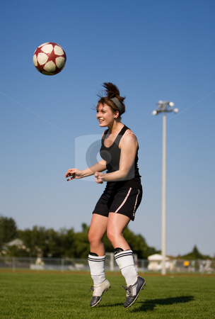 Soccer player Soccer player stock photo, A female soccer player heading the soccer ball by Steve Mcsweeny
