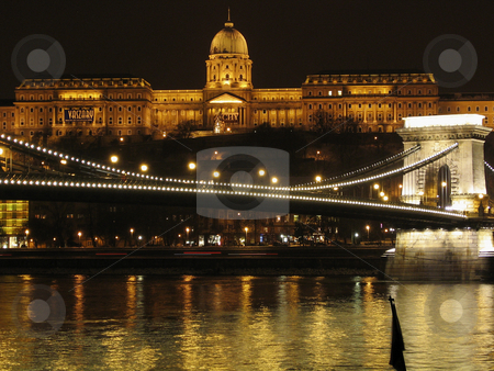 To use this stock image in your creative project, please select the size you need over to the right and click the "Add to Cart" button.
Your downloaded image will come with the Cutcaster watermark removed so don’t worry about the watermark you see on this page. Budapest Chain Bridge and royal palace stock photo, Budapest Chain Bridge and royal palace at night by Alessandro Rizzolli