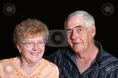 To use this stock image in your creative project, please select the size you need over to the right and click the "Add to Cart" button.
Your downloaded image will come with the Cutcaster watermark removed so don’t worry about the watermark you see on this page. Senior Couple stock photo, Portrait of a senior couple in their mid to late sixties. by Brenda Carson