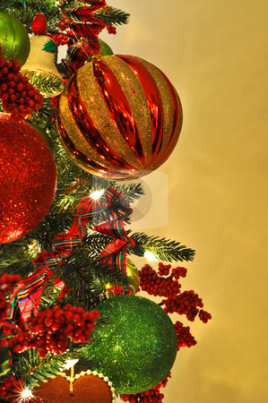 To use this stock image in your creative project, please select the size you need over to the right and click the "Add to Cart" button.
Your downloaded image will come with the Cutcaster watermark removed so don’t worry about the watermark you see on this page. Christmas Tree Decorations stock photo, Christmas Tree Decorations. Focus on Large Red and Gold Ornament with copy space. by Mark Winfrey