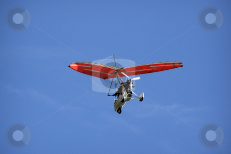 To use this stock image in your creative project, please select the size you need over to the right and click the "Add to Cart" button.
Your downloaded image will come with the Cutcaster watermark removed so don’t worry about the watermark you see on this page. Hang-glider stock photo, Foot launched aeroplane on the sky by Sergej Razvodovskij