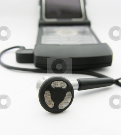 To use this stock image in your creative project, please select the size you need over to the right and click the "Add to Cart" button.
Your downloaded image will come with the Cutcaster watermark removed so don’t worry about the watermark you see on this page. Earbud with Cell Phone stock photo, by Kirsty Pargeter