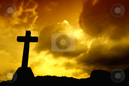To use this stock image in your creative project, please select the size you need over to the right and click the "Add to Cart" button.
Your downloaded image will come with the Cutcaster watermark removed so don’t worry about the watermark you see on this page. Cross stock photo, Cross detail in silhouette and the clouds in the sky by Rui Vale de Sousa
