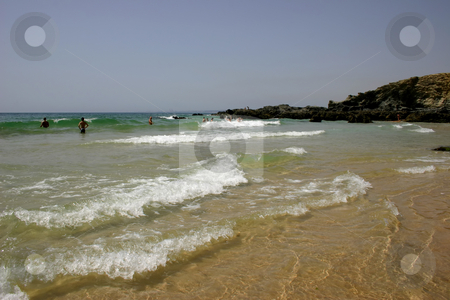 To use this stock image in your creative project, please select the size you need over to the right and click the "Add to Cart" button.
Your downloaded image will come with the Cutcaster watermark removed so don’t worry about the watermark you see on this page. Beach stock photo, People on the beach by Rui Vale de Sousa