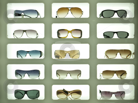 To use this stock image in your creative project, please select the size you need over to the right and click the "Add to Cart" button.
Your downloaded image will come with the Cutcaster watermark removed so don’t worry about the watermark you see on this page. Sunglasses 02 stock photo, Sunglases displayed in three columns and lit from the background by Jose .