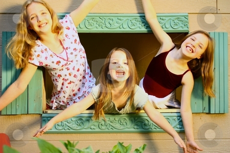To use this stock image in your creative project, please select the size you need over to the right and click the "Add to Cart" button.
Your downloaded image will come with the Cutcaster watermark removed so don’t worry about the watermark you see on this page. Three girls looking out dollhouse window stock photo, Three girls looking out dollhouse window by Gregory Dean
