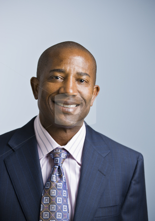 African American male African American male stock photo, Attractive African American headshot dressed in a suit and tie, facing the camera. vertical by Jonathan Ross