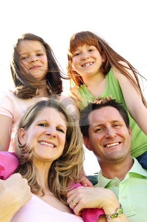 To use this stock image in your creative project, please select the size you need over to the right and click the "Add to Cart" button.
Your downloaded image will come with the Cutcaster watermark removed so don’t worry about the watermark you see on this page. Happy family stock photo, Portrait of happy family giving children shoulder rides by Elena Elisseeva