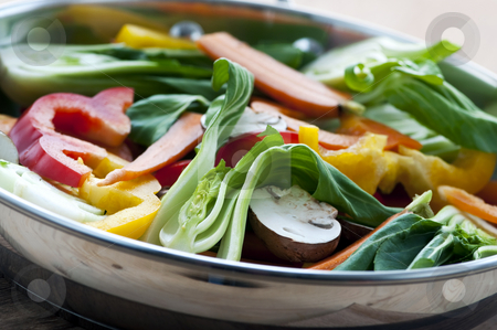 To use this stock image in your creative project, please select the size you need over to the right and click the "Add to Cart" button.
Your downloaded image will come with the Cutcaster watermark removed so don’t worry about the watermark you see on this page. Vegetable stir fry stock photo, Vegetable stir fry of bok choy mushroom peppers carrots by Elena Elisseeva
