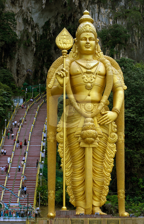 Lord Murugan statue Batu Caves Lord Murugan statue Batu Caves stock photo, Statue of Lord Murugan with steps leading to Batu Caves by Robert Ford