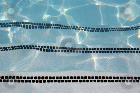 To use this stock image in your creative project, please select the size you need over to the right and click the "Add to Cart" button.
Your downloaded image will come with the Cutcaster watermark removed so don’t worry about the watermark you see on this page. Pool Steps stock photo, Steps going down into a pool. by Brandon Seidel