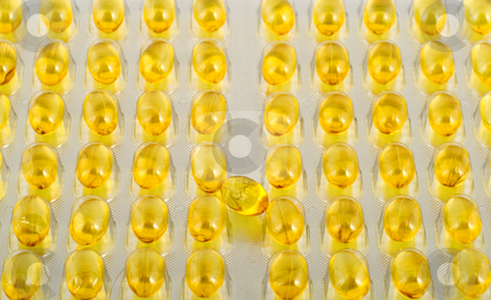 To use this stock image in your creative project, please select the size you need over to the right and click the "Add to Cart" button.
Your downloaded image will come with the Cutcaster watermark removed so don’t worry about the watermark you see on this page. Fish oil capsule stock photo, Fish oil capsule translucent on background of the capsules,close-up. by Vladyslav Danilin