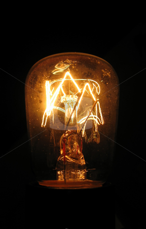 To use this stock image in your creative project, please select the size you need over to the right and click the "Add to Cart" button.
Your downloaded image will come with the Cutcaster watermark removed so don’t worry about the watermark you see on this page. Old Lightbulb (5394) stock photo, Old Vintage lightbulb, still working by Germán Ariel Berra