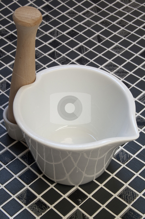To use this stock image in your creative project, please select the size you need over to the right and click the "Add to Cart" button.
Your downloaded image will come with the Cutcaster watermark removed so don’t worry about the watermark you see on this page. Mortar and pestle stock photo, A mortar and pestle. by Jeff Carson