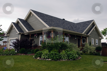 To use this stock image in your creative project, please select the size you need over to the right and click the "Add to Cart" button.
Your downloaded image will come with the Cutcaster watermark removed so don’t worry about the watermark you see on this page. Country style house stock photo, Picture of a typical North American Country Style house by Alain Turgeon