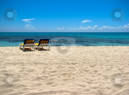 To use this stock image in your creative project, please select the size you need over to the right and click the "Add to Cart" button.
Your downloaded image will come with the Cutcaster watermark removed so don’t worry about the watermark you see on this page. Vacation at the beach stock photo, A beach scene with blue heaven, clouds and turquoise water by Alexander Zschach