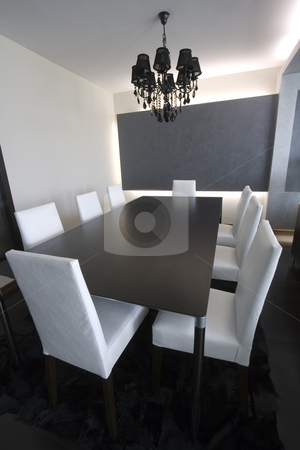 To use this stock image in your creative project, please select the size you need over to the right and click the "Add to Cart" button.
Your downloaded image will come with the Cutcaster watermark removed so don’t worry about the watermark you see on this page. Trendy Modern Dining Room stock photo, Trendy Modern Dining Room and Dinner Table by Mehmet Dilsiz