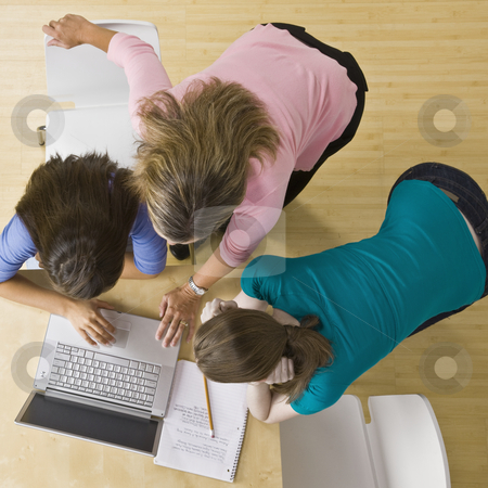 To use this stock image in your creative project, please select the size you need over to the right and click the "Add to Cart" button.
Your downloaded image will come with the Cutcaster watermark removed so don’t worry about the watermark you see on this page. Students using laptop in classroom stock photo, Students using laptop in classroom by Jonathan Ross