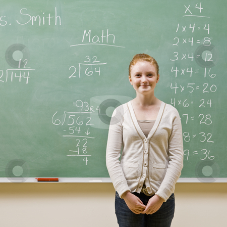 Student standing near blackboard Student standing near blackboard stock photo, Student standing near blackboard by Jonathan Ross