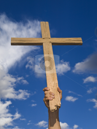 To use this stock image in your creative project, please select the size you need over to the right and click the "Add to Cart" button.
Your downloaded image will come with the Cutcaster watermark removed so don’t worry about the watermark you see on this page. Keeping the faith stock photo, A man?s hand keeping a wooden cross high in the sky. by Ignacio Gonzalez Prado