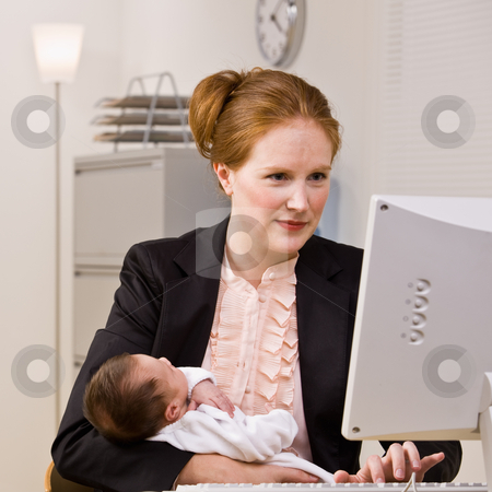 To use this stock image in your creative project, please select the size you need over to the right and click the "Add to Cart" button.
Your downloaded image will come with the Cutcaster watermark removed so don’t worry about the watermark you see on this page. Businesswoman holding baby at desk stock photo, Businesswoman holding baby at desk by Jonathan Ross