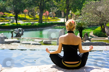To use this stock image in your creative project, please select the size you need over to the right and click the "Add to Cart" button.
Your downloaded image will come with the Cutcaster watermark removed so don’t worry about the watermark you see on this page. Meditation stock photo, Meditating blonde girl in the tropical park by Dmitry Rostovtsev