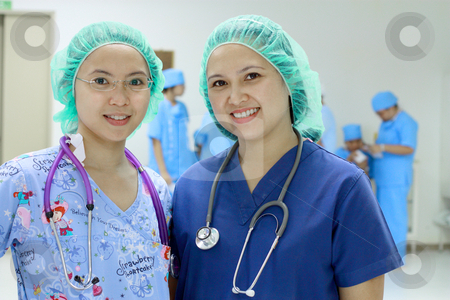 To use this stock image in your creative project, please select the size you need over to the right and click the "Add to Cart" button.
Your downloaded image will come with the Cutcaster watermark removed so don’t worry about the watermark you see on this page. Asian nurses stock photo, Portrait of confident asian nurses by Claro Alindogan