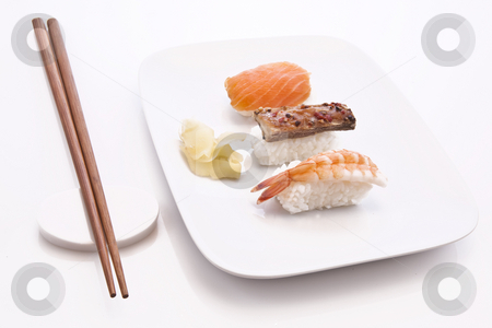 To use this stock image in your creative project, please select the size you need over to the right and click the "Add to Cart" button.
Your downloaded image will come with the Cutcaster watermark removed so don’t worry about the watermark you see on this page. Sushi stock photo, Sushi with white plate and chopsticks by Jon Le-Bon