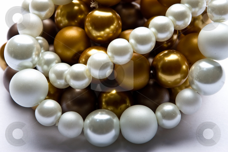 To use this stock image in your creative project, please select the size you need over to the right and click the "Add to Cart" button.
Your downloaded image will come with the Cutcaster watermark removed so don’t worry about the watermark you see on this page. Costume Juwelery stock photo, Pearl designer costume jewelery in macro on white background by Adriaan Van den Berg